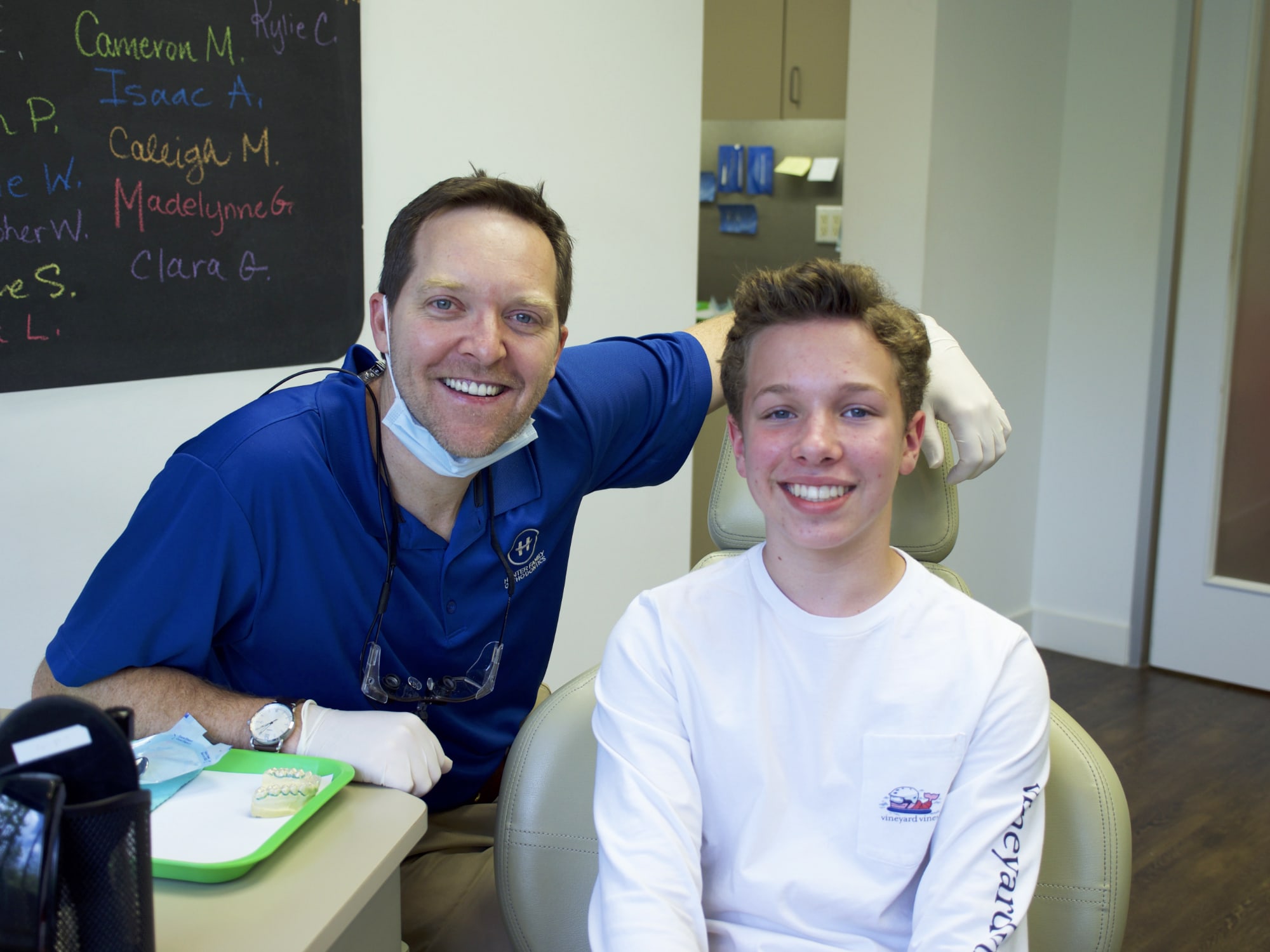 Dr. Ross Hunter with a teen patient