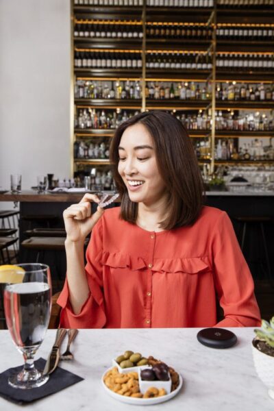 lady holding a clear retainer